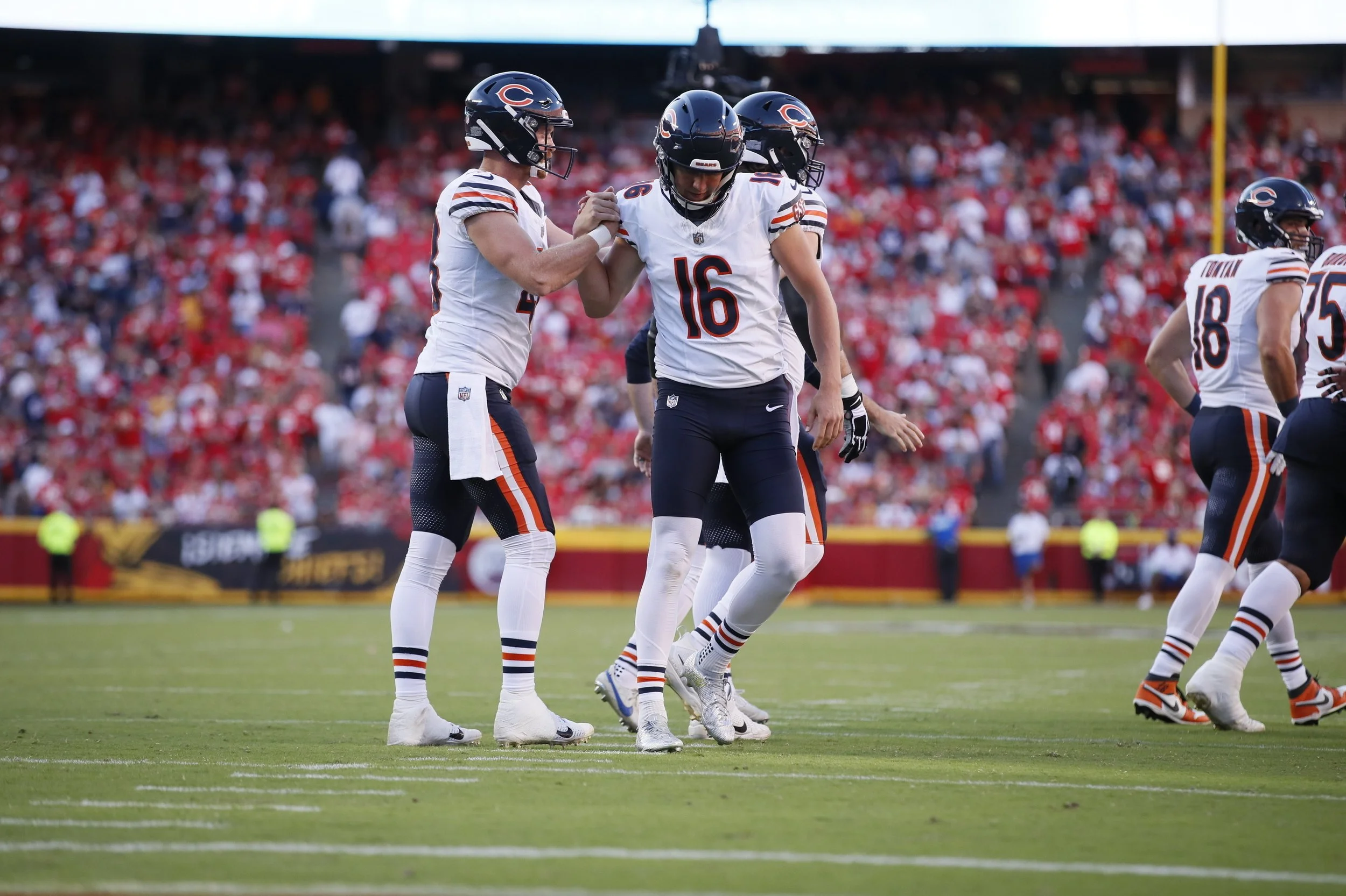 Chicago Bears football players celebrating on the field during a game